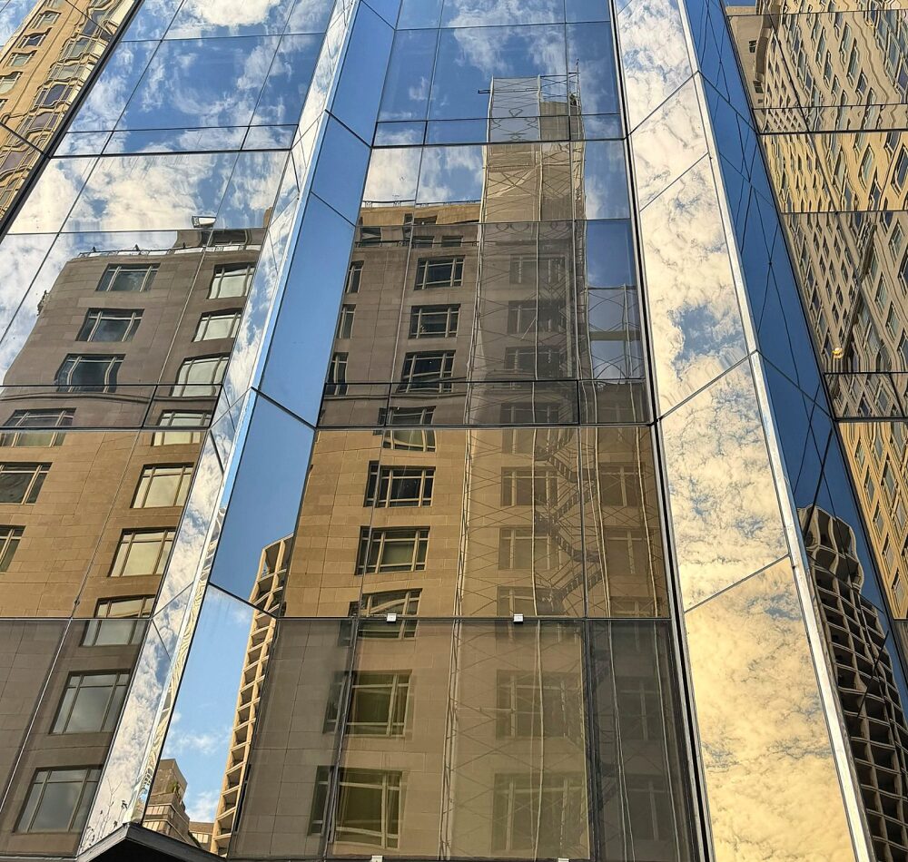 Existing bronze mirror glass being matched for replacement at Trump International Hotel & Tower