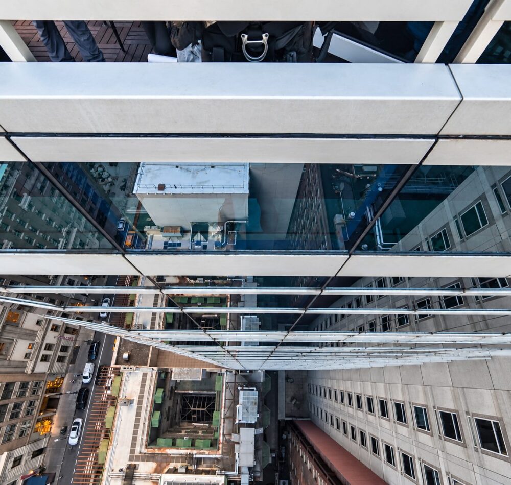 Aerial view of the Sofitel Hotel curtain wall during glass replacement