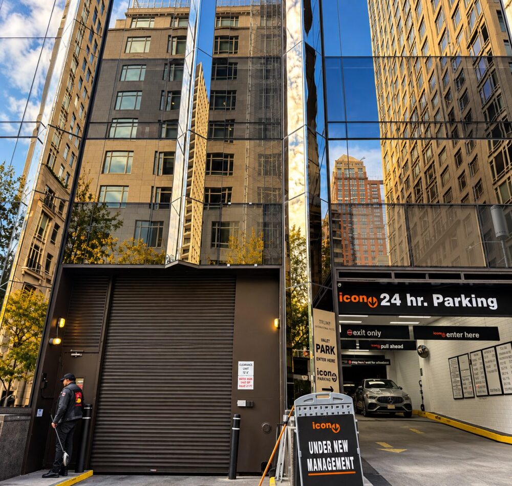 Reflective bronze mirror spandrel glass along the podium of 1 Central Park West